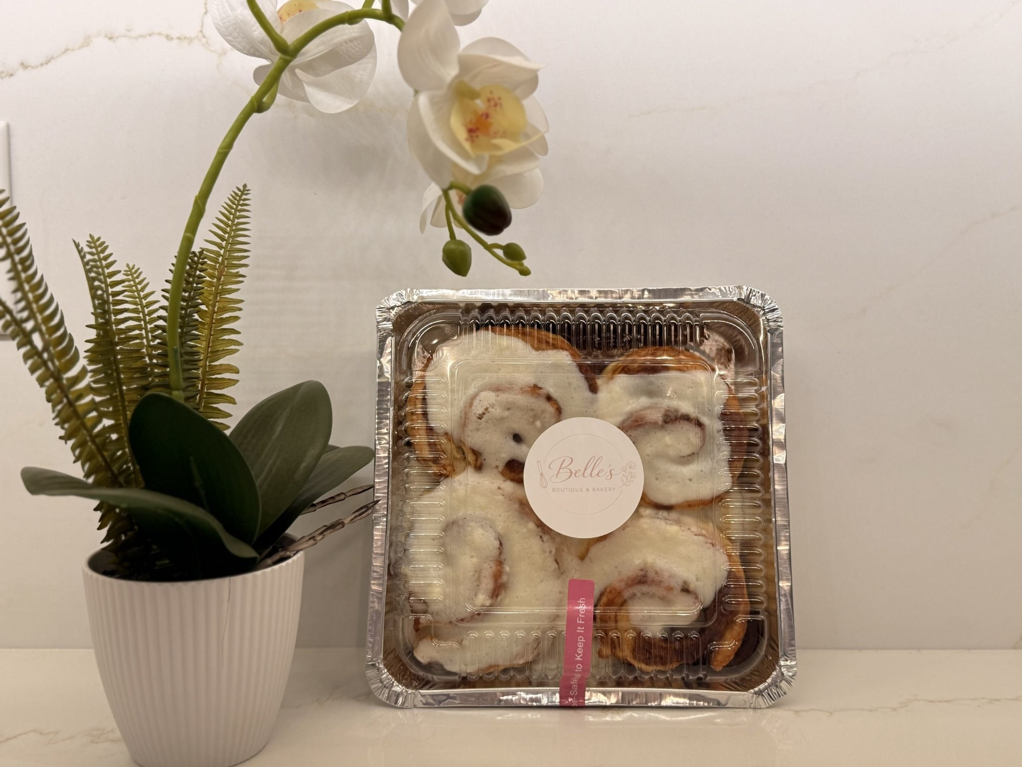 Sourdough cinnamon rolls packaged at Belles