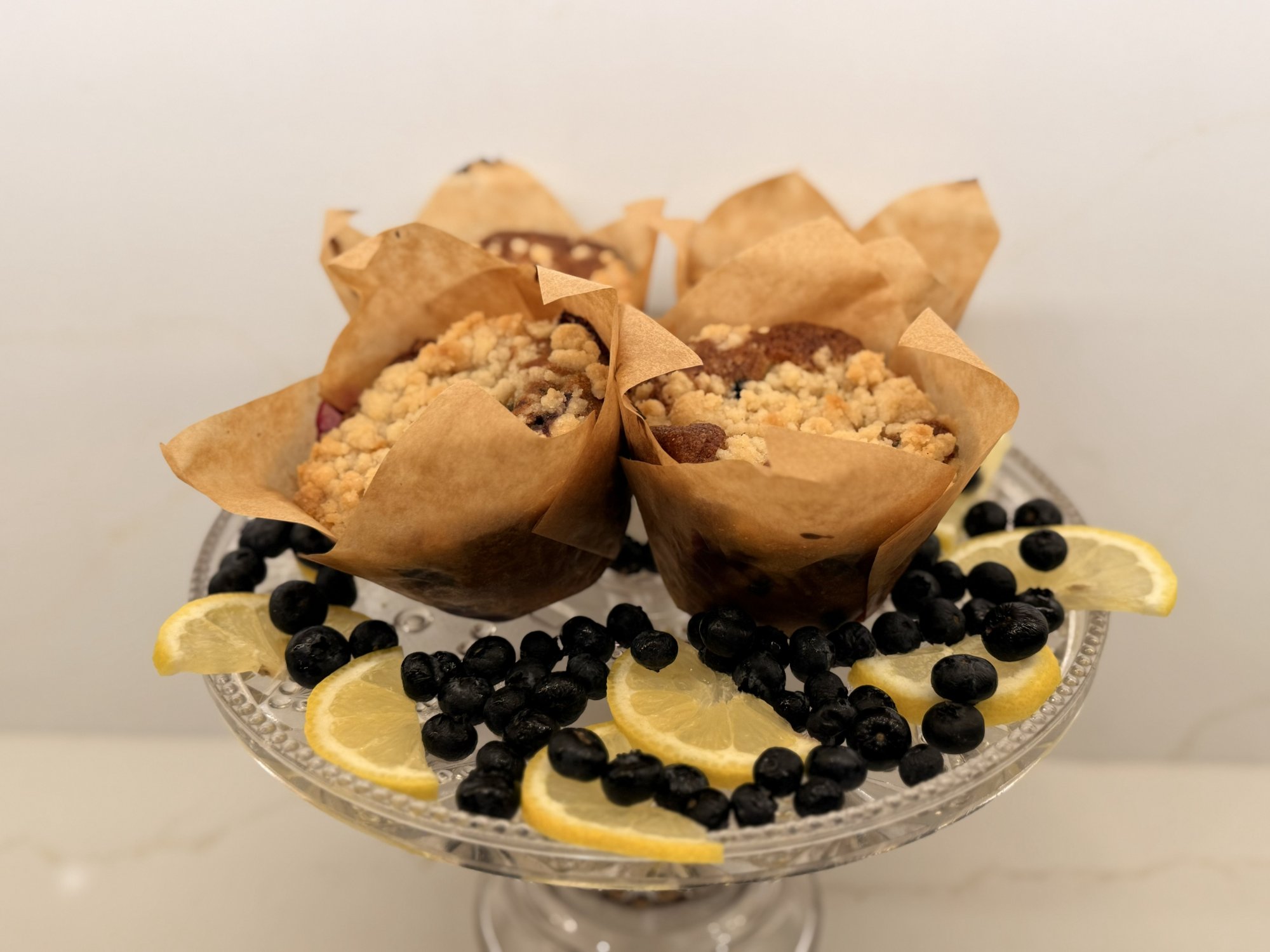 Lemon blueberry muffin with coffee — Belles Boutique & Bakery
